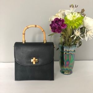 Cross body purse with bamboo handle